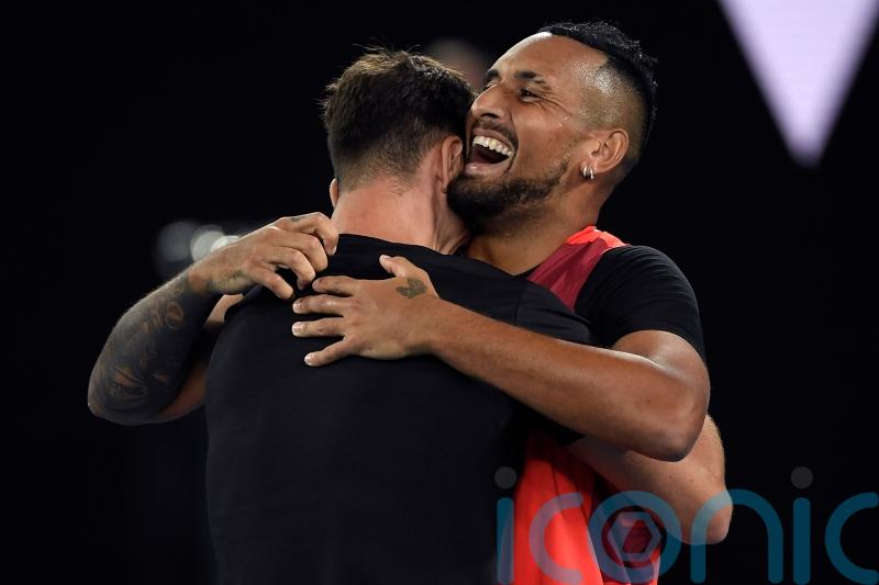 Nick Kyrgios lands first grand slam title by winning men’s doubles in Melbourne