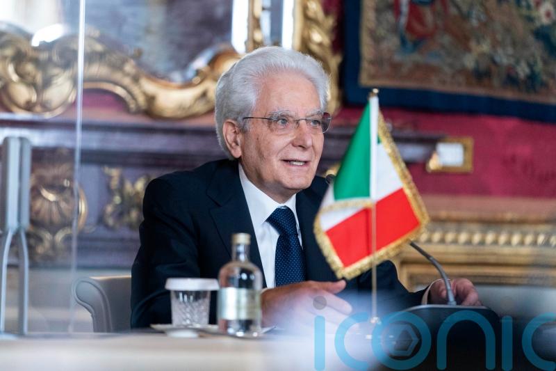 Italy’s 80-year-old president wins vote to stay for second term