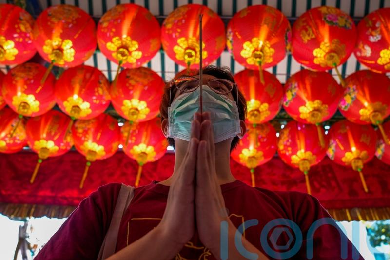 Lunar New Year: Celebrations for Year of the Tiger are muted but bring hope