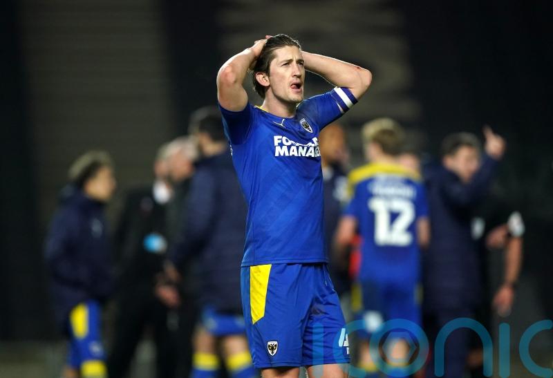 AFC Wimbledon to make late call on Alex Woodyard