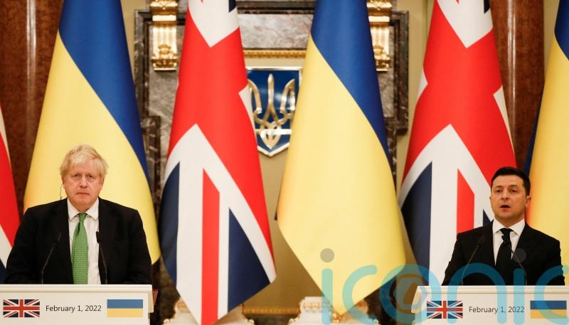 Boris Johnson uses Ukraine trip to urge Russia to ‘step back’