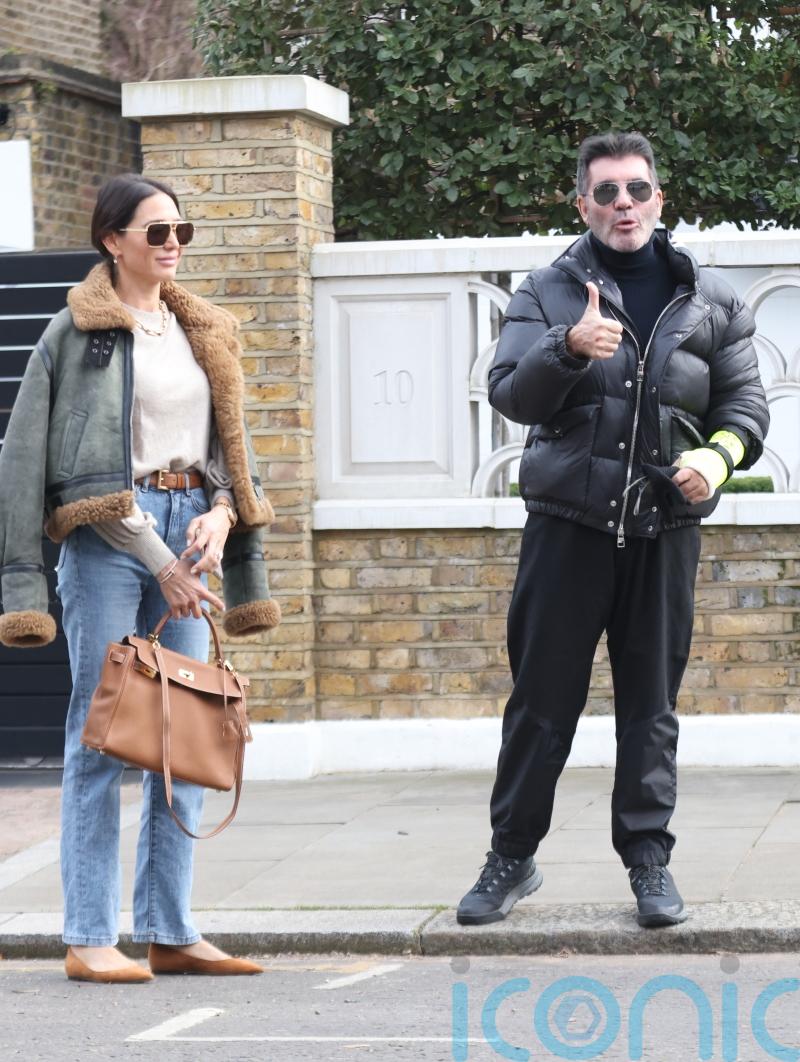 Simon Cowell gives thumbs-up after injuring arm in electric bike accident