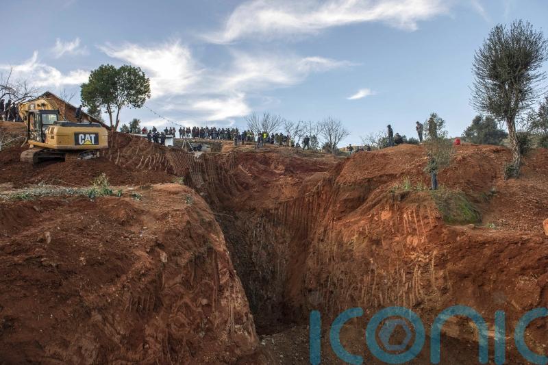 Moroccan rescuers dig down to save boy trapped in well