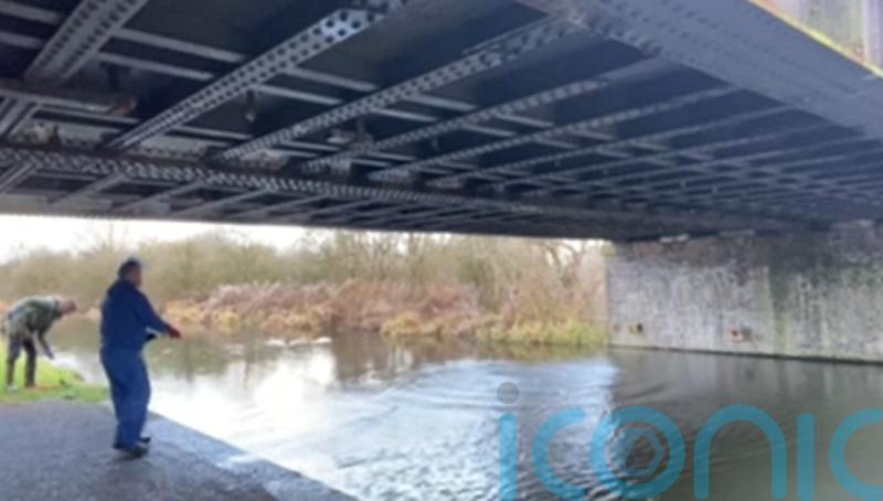 Magnet fisherman hoists dozens of small explosive devices from canal