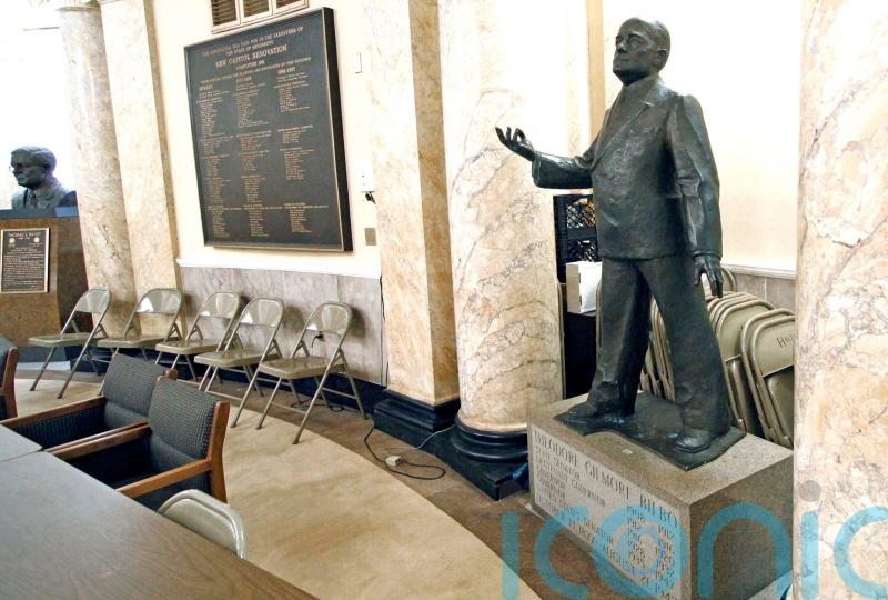 Statue of white supremacist former US state governor moved out of sight