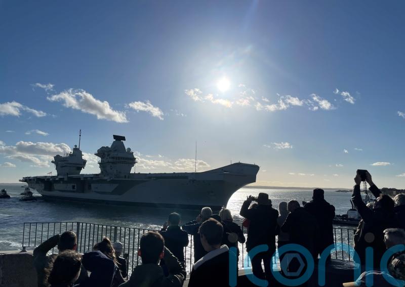 Royal Navy aircraft carrier returns to Portsmouth home base
