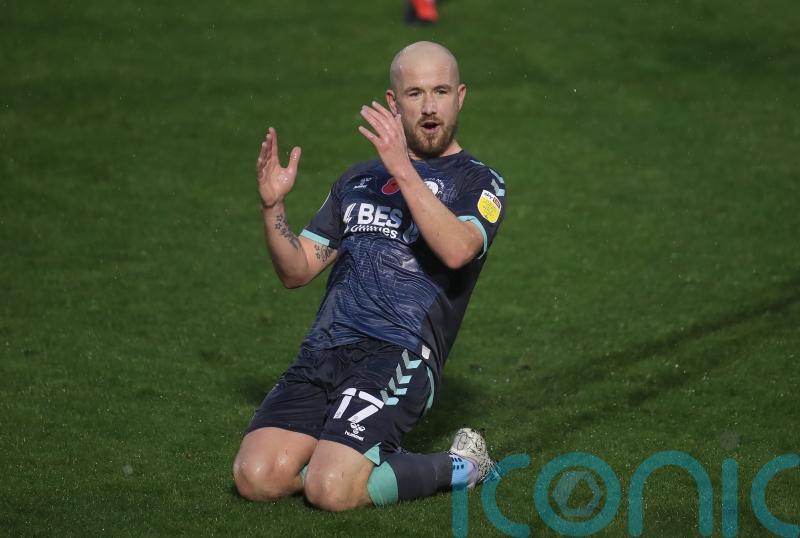 Stockport stay top with narrow win over 10-man Dover