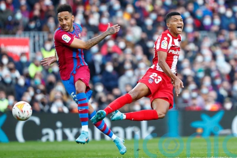 Aubameyang makes Barcelona debut in frenetic victory over Atletico Madrid