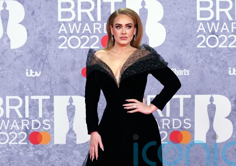 Adele hails female artists as she accepts gender-neutral gong at Brits
