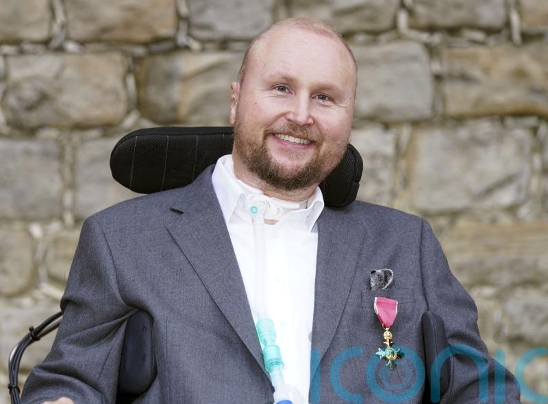 Paralysed rugby player ‘really chuffed’ with OBE from Anne