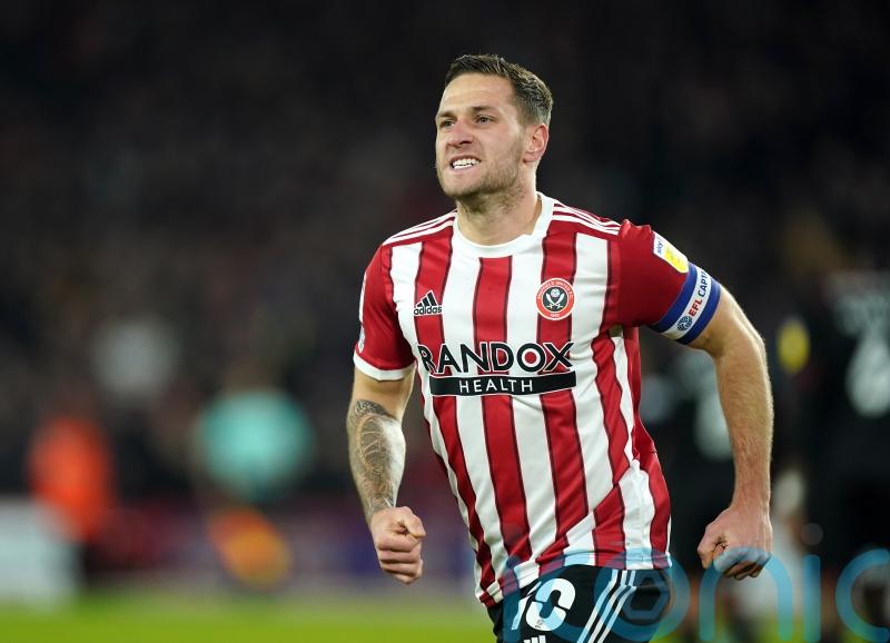 Billy Sharp leads from the front as Sheffield United march on