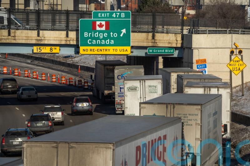 Ford plant forced to shut due to bridge blockade amid Covid protests in Canada