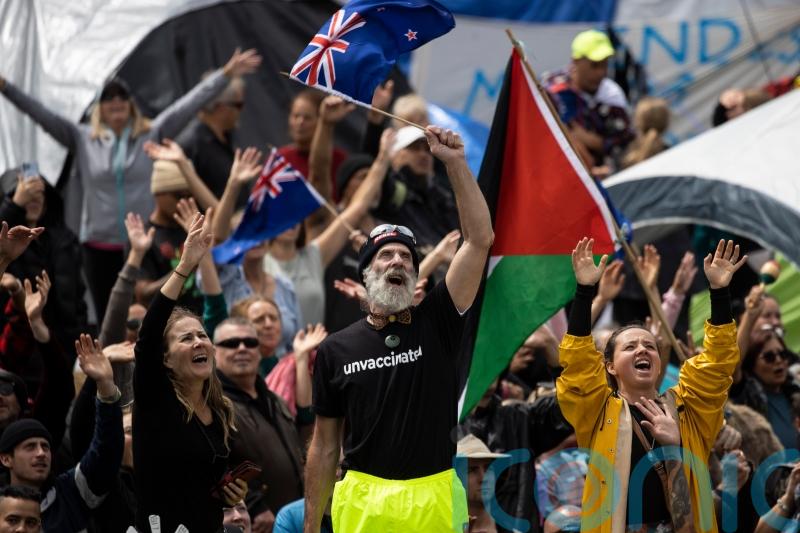New Zealand’s prime minister signals harsher stance on vaccine protest