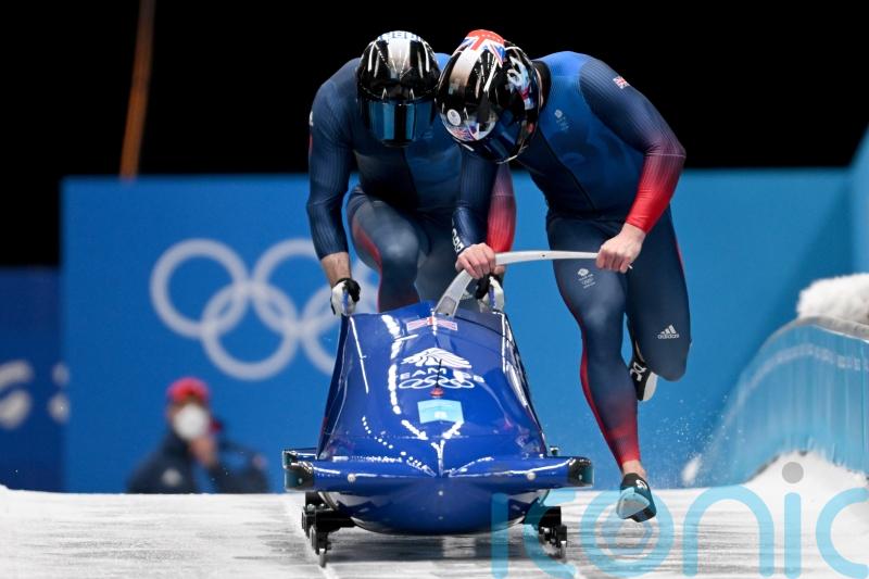 Brad Hall’s medal hopes in two-man bobsleigh all but over in Beijing
