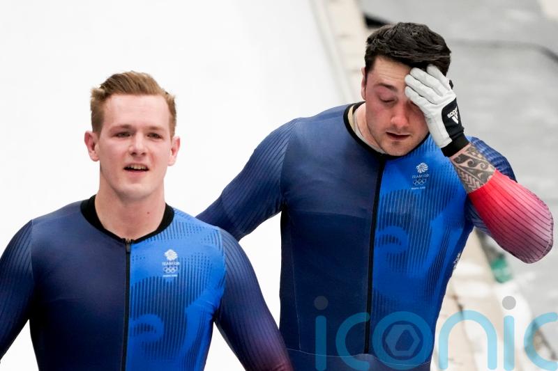 British pair Brad Hall and Nick Gleeson crash in two-man bobsleigh
