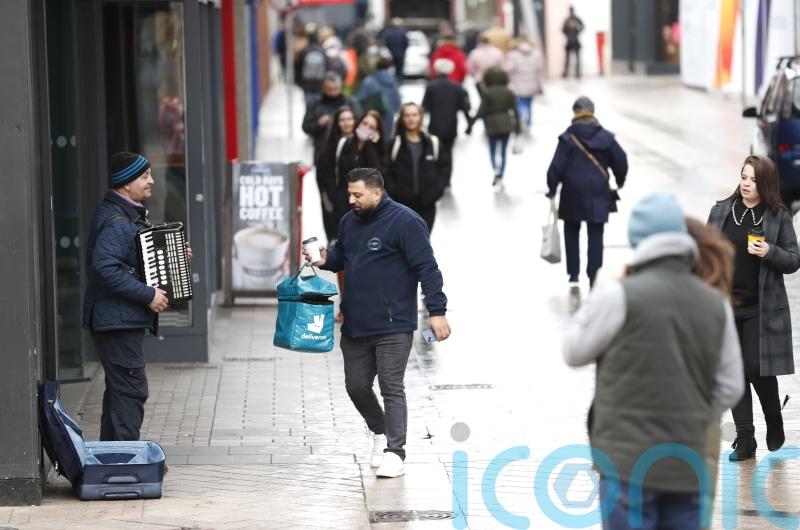 Traders hope easing of Covid rules is ‘beginning of the end’ of pandemic