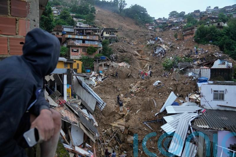 Mudslides and floods kill at least 18 outside Rio