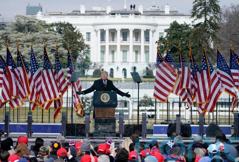 Judge rejects effort by Trump to toss Capitol riot lawsuits