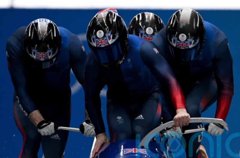 Great Britain in medal contention at the halfway mark of the four-man bobsleigh