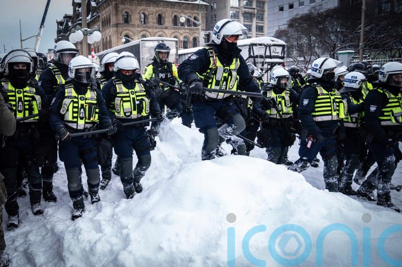 Canadian police clear parliament’s streets to end siege