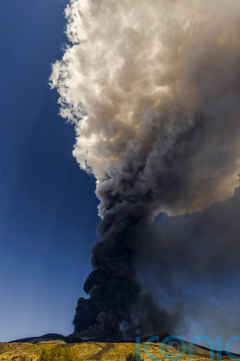 Towering volcanic ash cloud rises into sky as Mount Etna roars again