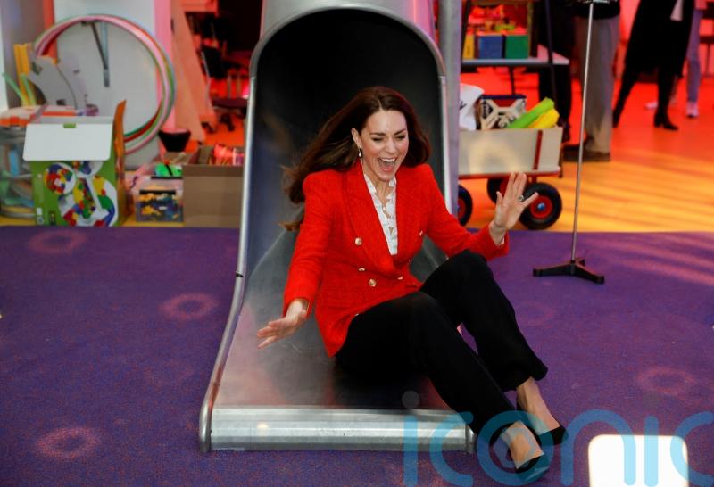 Kate shows her delight as she enjoys helter-skelter slide in Denmark