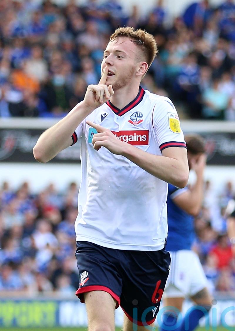 Substitutes hit late double as Bolton keep run going with victory over Lincoln