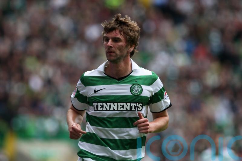 Ex-Celtic star McCourt protests innocence in court appearance on sex charge