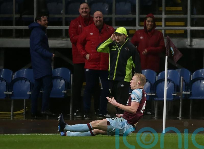Ben Mee heads winner as Burnley stun Tottenham to boost survival hopes