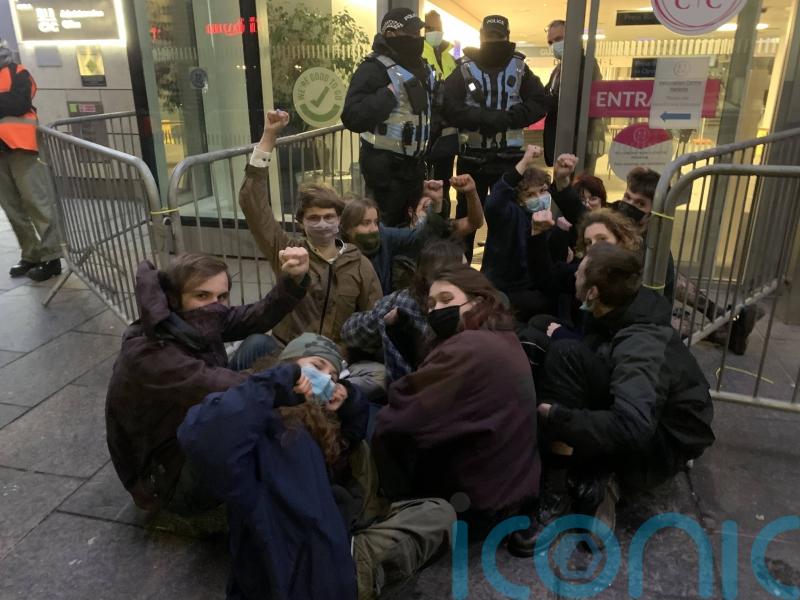 Extinction Rebellion activists interrupt black-tie dinner for oil and gas firms