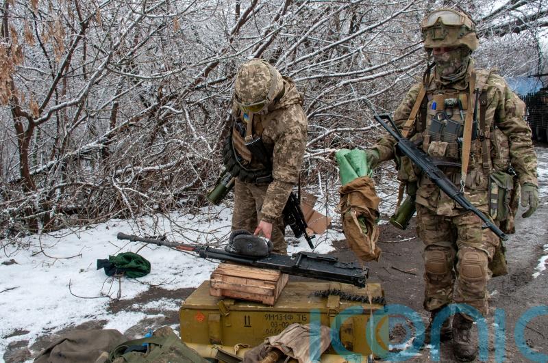 Ukraine rejects Belarus as venue for talks as Russian troops enter Kharkiv