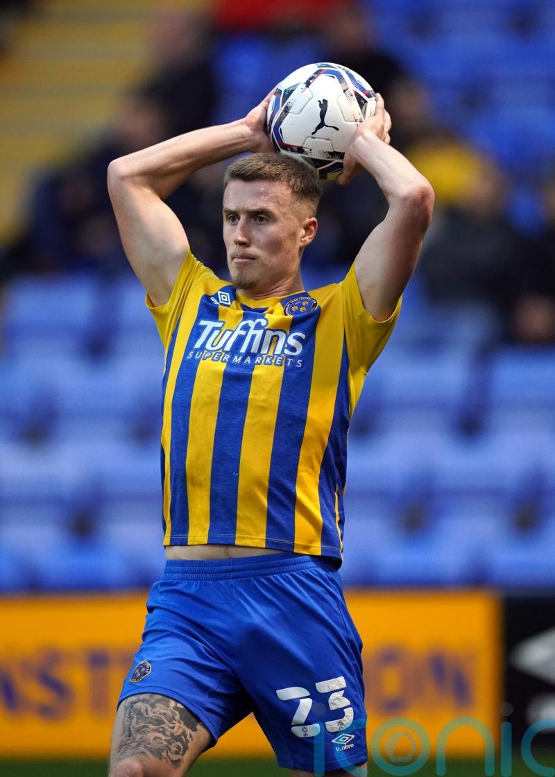 Shrewsbury dominant as leaders Rotherham cling on for draw