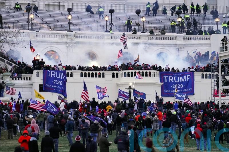 First US Capitol riot suspect to face trial ‘lit match that started the fire’