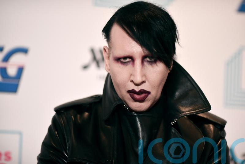 Marilyn Manson sues former fiance Evan Rachel Wood over abuse claims