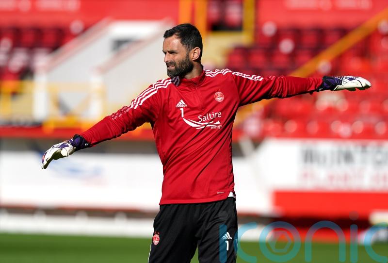 Joe Lewis says struggling Dons need ‘spark’ as they try to turn season around