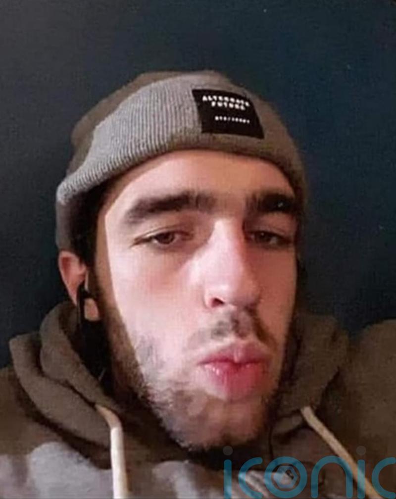 Man charged with murdering 20-year-old sought by police