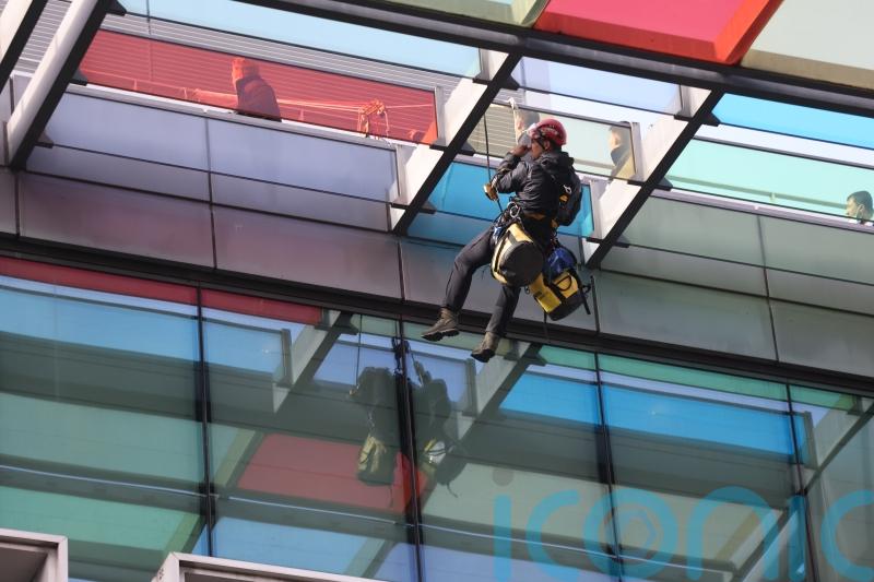 Activists who scaled government building to face fresh trial