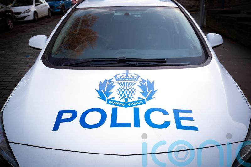 Man, 75, dies after car overturns near shopping centre