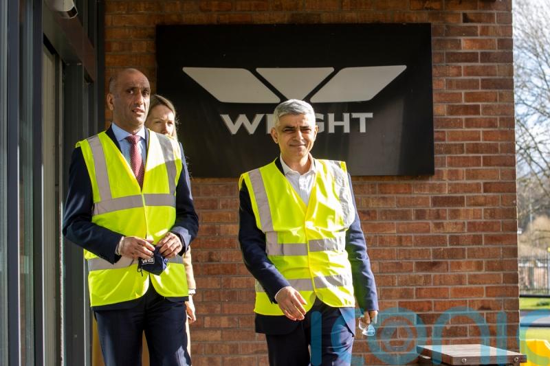 Khan calls for funding certainty for TfL during visit to Co Antrim bus plant
