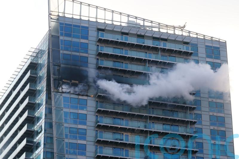 Fire breaks out at high-rise block of flats and offices in east London