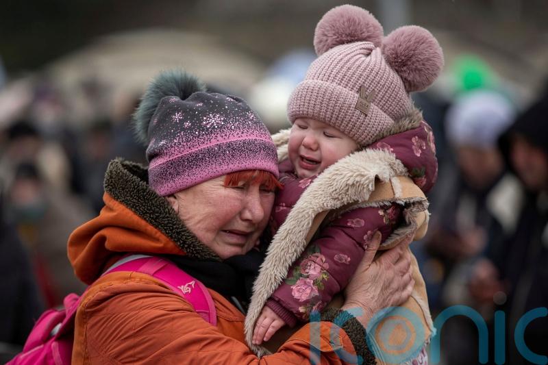 Russian shelling so relentless ‘we can’t even gather up’ the dead, mayor says
