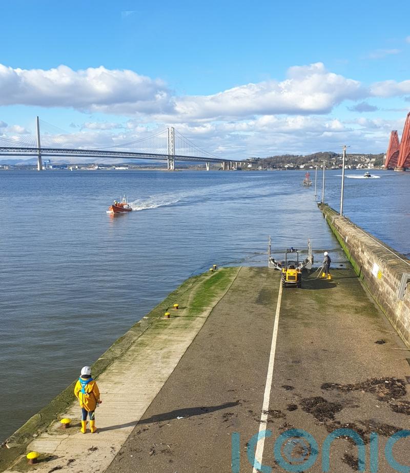 Dozens stranded on island in Firth of Forth are rescued by lifeboat
