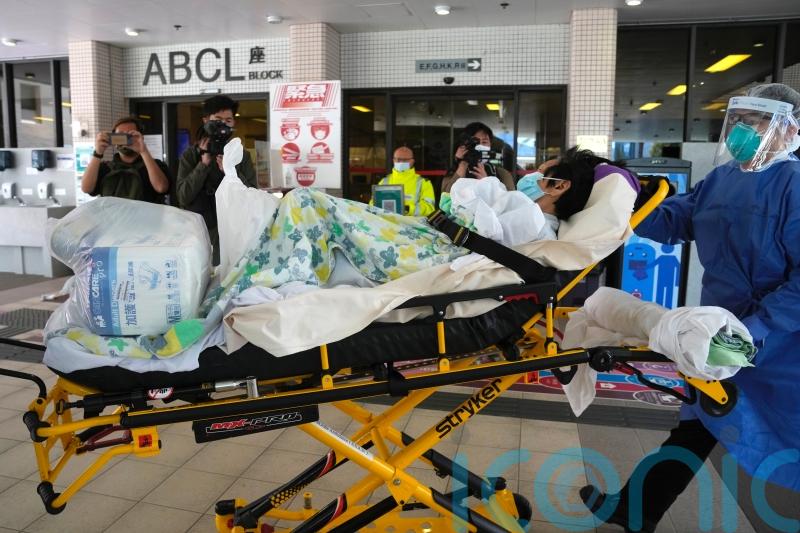 Hong Kong leader says no fixed timeframe for mass testing as Covid deaths soar