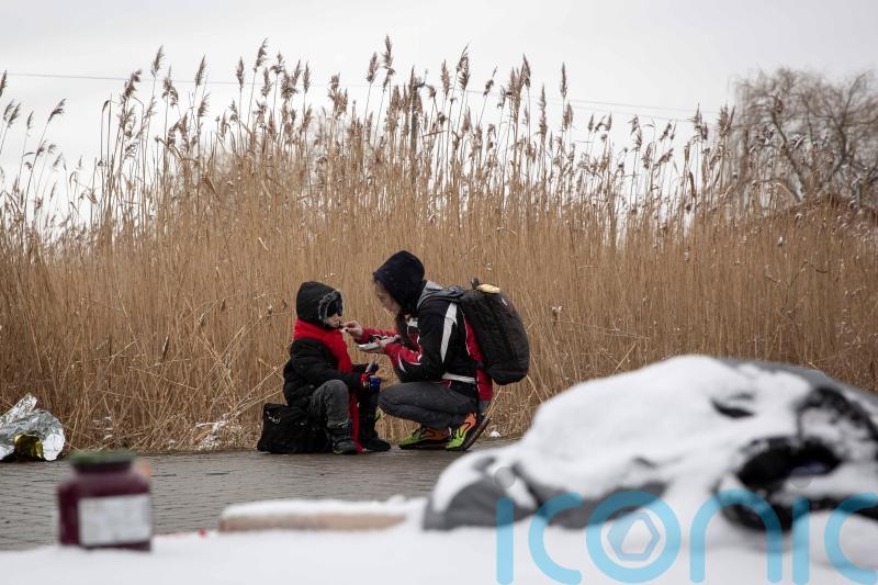 Ukrainians flee besieged cities as conditions worsen