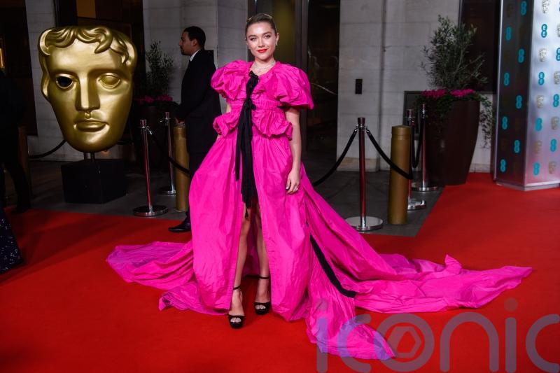 11 of the most colourful outfits from Bafta red carpet history