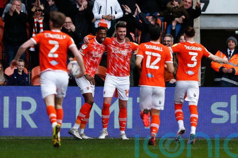 Early Gary Madine header earns Blackpool victory over Swansea