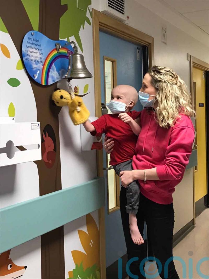 Boy aged five with diagnosis “rarer than winning the lottery” is all smiles after special train brings Sooty and Sweep to his hospital room