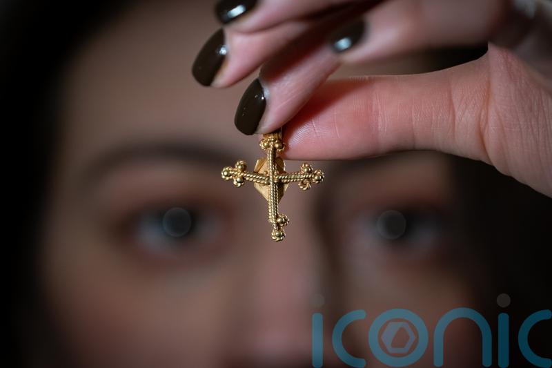 Roofer ‘over the moon’ after medieval cross sells at auction for £12,400