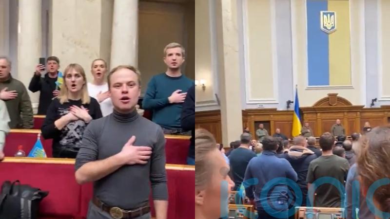 Ukrainian MPs sing national anthem at emergency parliamentary session in Kyiv