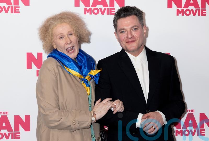 Catherine Tate attends The Nan Movie screening in character